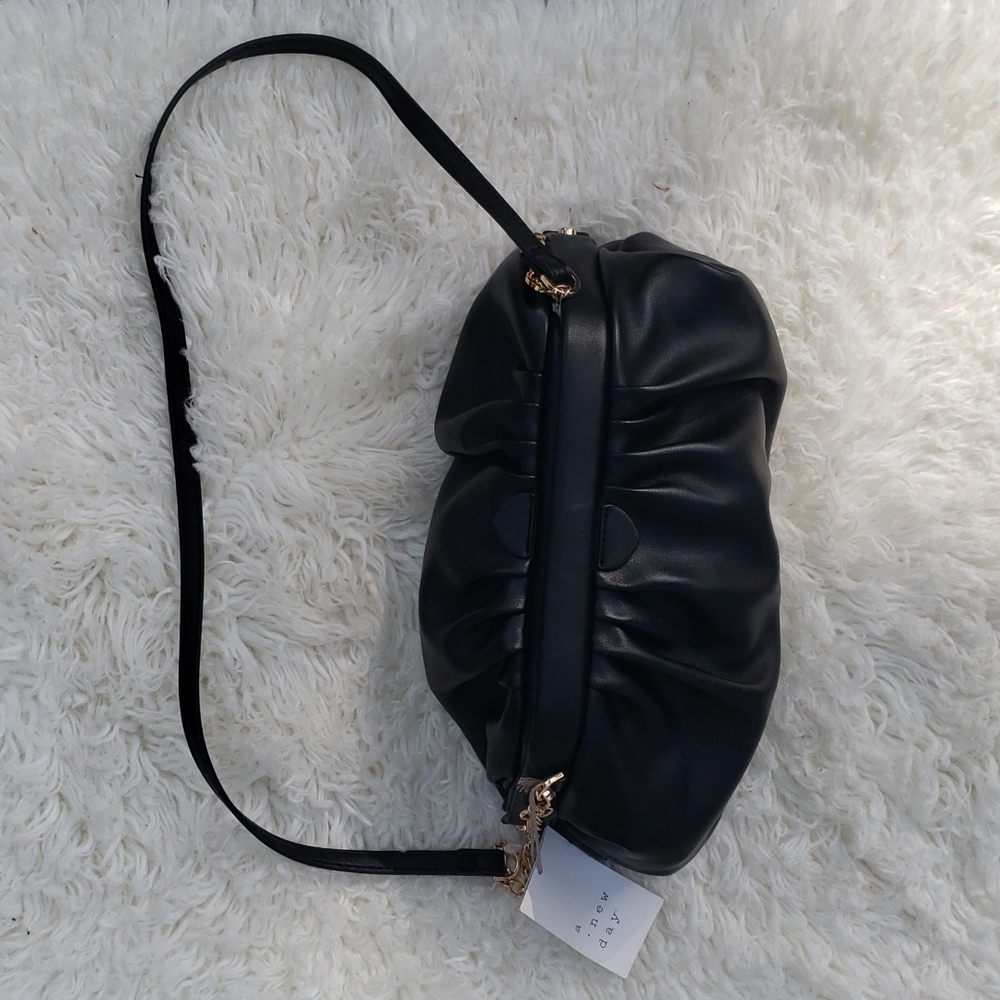 A new day handbag with detachable crossbody strap